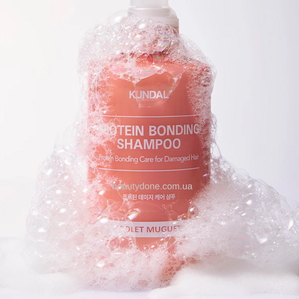 Восстанавливающий протеиновый шампунь Фиалковый Мюге Kundal Protein Bonding Shampoo Violet Muguet 50ml 6788 фото